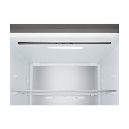 LG GBBS514CPY refrigerator with freezer below, close-up of upper section with lighting and shelves