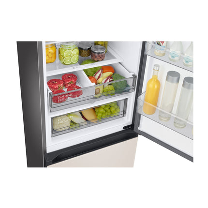 Samsung RB38C7B5D39/EF refrigerator with freezer below, open doors, products in Optimal Fresh compartment and fruit and vegetable drawer