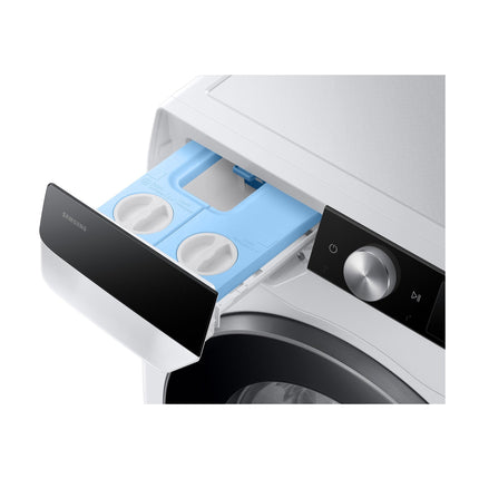 Samsung WW11DG6B85LKU4 washing machine, open detergent drawer with compartments viewed from above at an angle